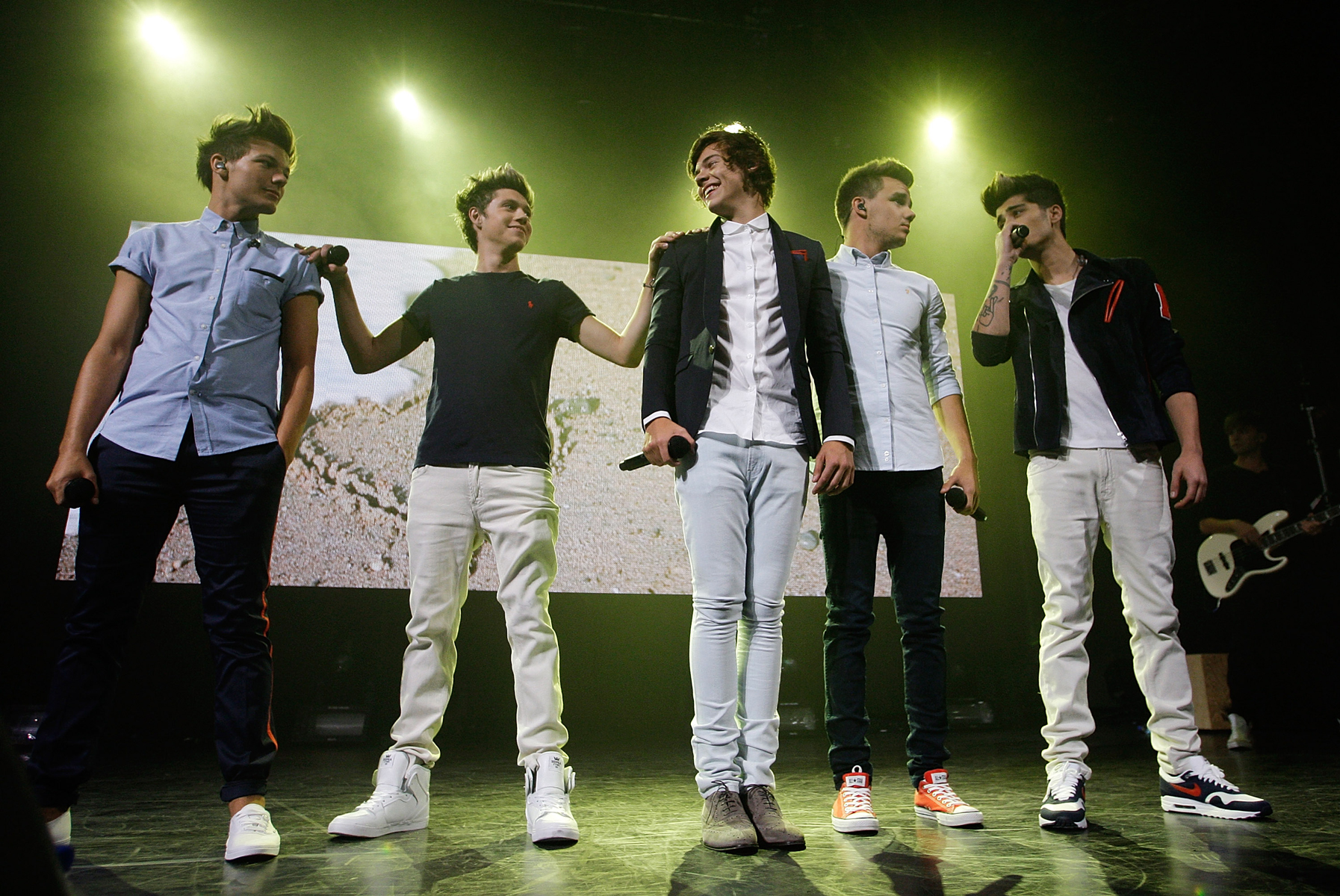 Louis Tomlinson, Niall Horan, Harry Styles, Liam Payne and Zayn Malik of One Direction perform on stage at The Roundhouse on September 20, 2012 in London, United Kingdom. 